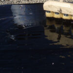 Gravel BUR repair with #037 Modified Thermoplastic Roof Coating