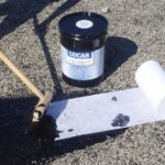 Gravel BUR repair with #037 Modified Thermoplastic Roof Coating and Tietex Polyester Fabric