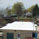 Building housing pool pumps and equipment coated with #8000 High Solids silicone Roof Coating