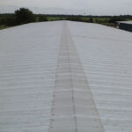Pre-work metal coated with Lucas #1010 Sunblock Elastomeric Roof Coating